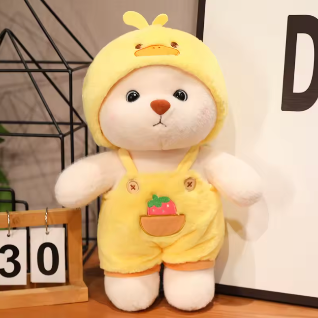 bear dressed in a cute yellow outfit