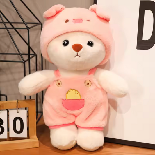 Bear dressed in a cute pink pig-themed outfit